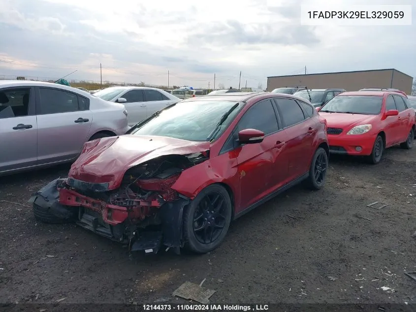 2014 Ford Focus Se VIN: 1FADP3K29EL329059 Lot: 12144373