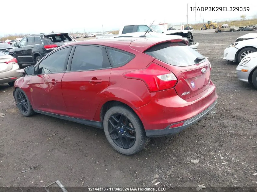 2014 Ford Focus Se VIN: 1FADP3K29EL329059 Lot: 12144373