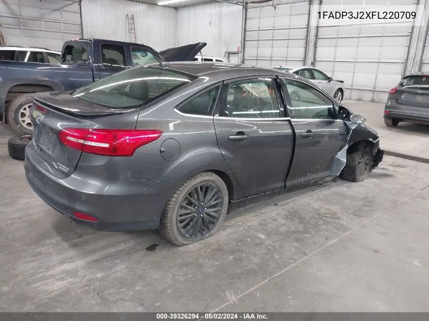 2015 Ford Focus Titanium VIN: 1FADP3J2XFL220709 Lot: 39326294