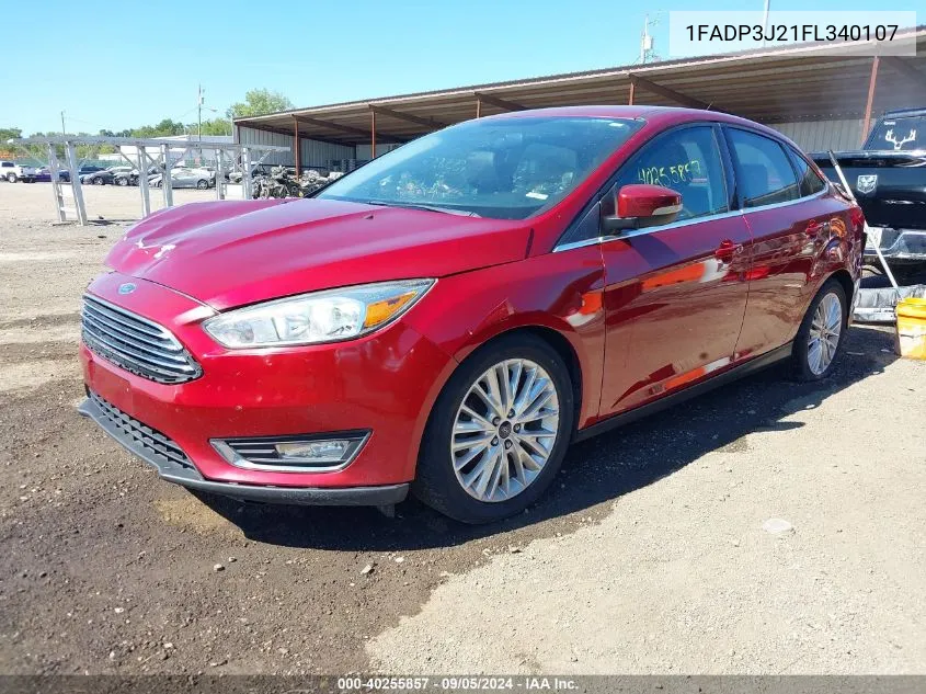 2015 Ford Focus Titanium VIN: 1FADP3J21FL340107 Lot: 40255857