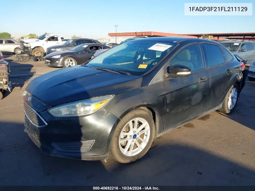 2015 Ford Focus Se VIN: 1FADP3F21FL211129 Lot: 40692216