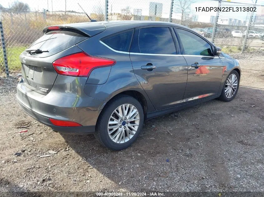 2015 Ford Focus Titanium VIN: 1FADP3N22FL313802 Lot: 40900249