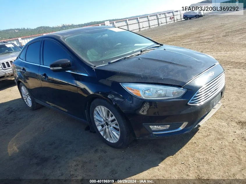 2016 Ford Focus Titanium VIN: 1FADP3J20GL369292 Lot: 40196919