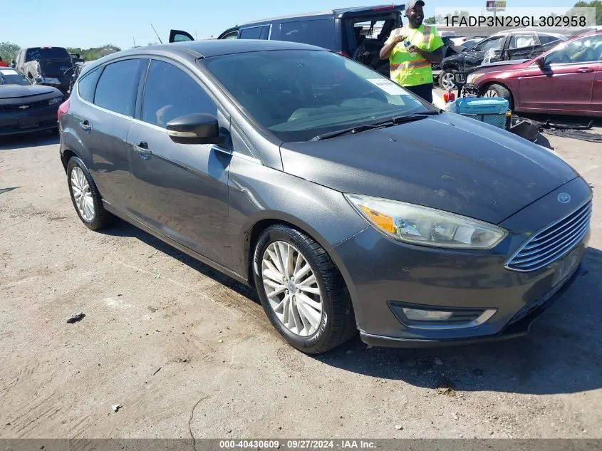 2016 Ford Focus Titanium VIN: 1FADP3N29GL302958 Lot: 40430609