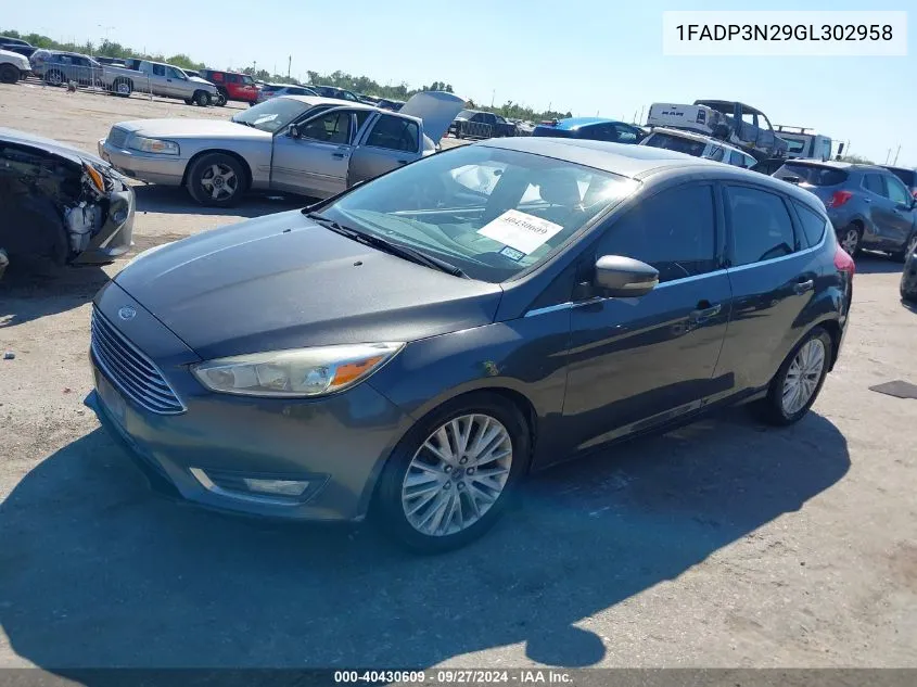 2016 Ford Focus Titanium VIN: 1FADP3N29GL302958 Lot: 40430609