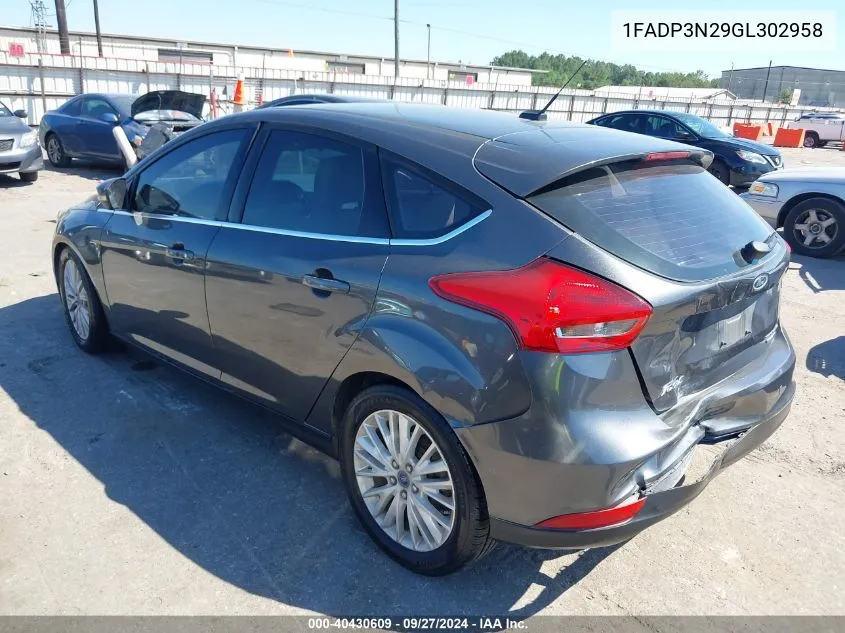 2016 Ford Focus Titanium VIN: 1FADP3N29GL302958 Lot: 40430609