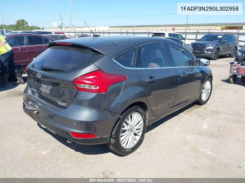 2016 Ford Focus Titanium VIN: 1FADP3N29GL302958 Lot: 40430609