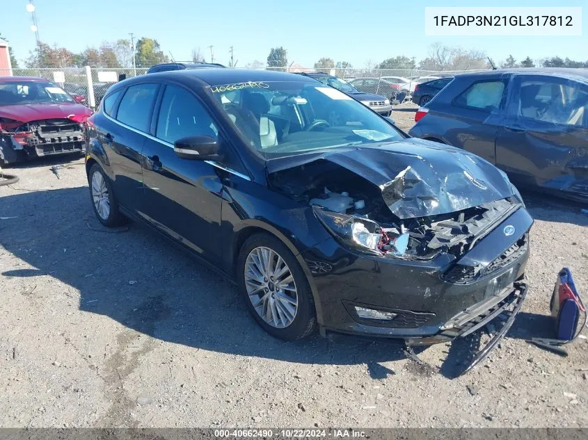 2016 Ford Focus Titanium VIN: 1FADP3N21GL317812 Lot: 40662490