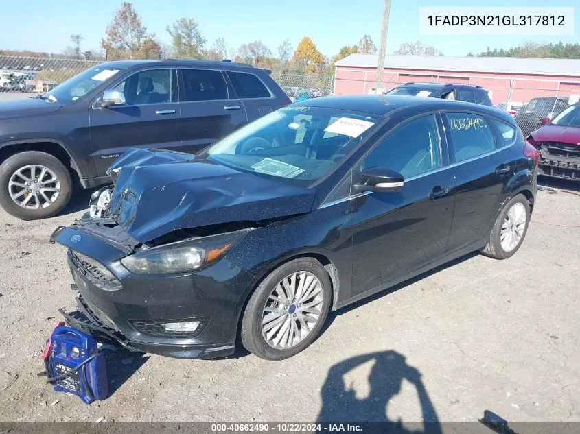 2016 Ford Focus Titanium VIN: 1FADP3N21GL317812 Lot: 40662490