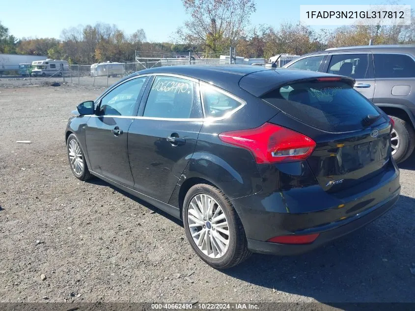 2016 Ford Focus Titanium VIN: 1FADP3N21GL317812 Lot: 40662490