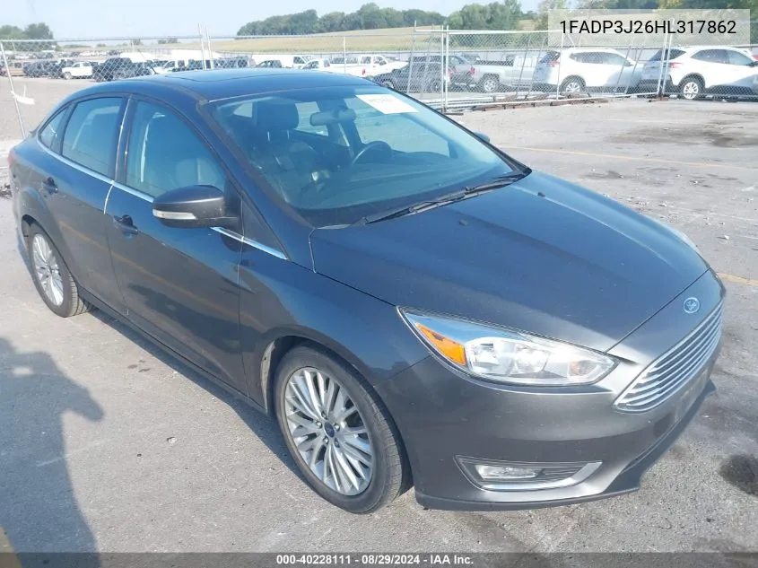 2017 Ford Focus Titanium VIN: 1FADP3J26HL317862 Lot: 40228111