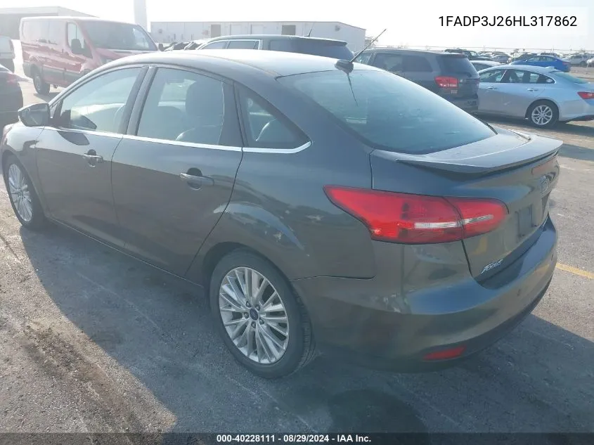 2017 Ford Focus Titanium VIN: 1FADP3J26HL317862 Lot: 40228111