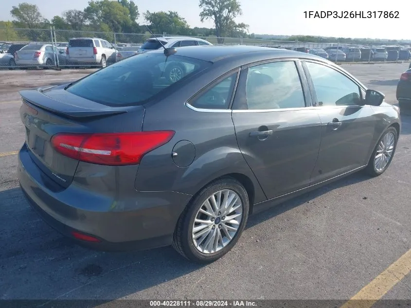 2017 Ford Focus Titanium VIN: 1FADP3J26HL317862 Lot: 40228111