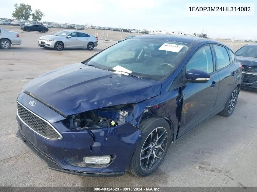 2017 Ford Focus Sel VIN: 1FADP3M24HL314082 Lot: 40324523