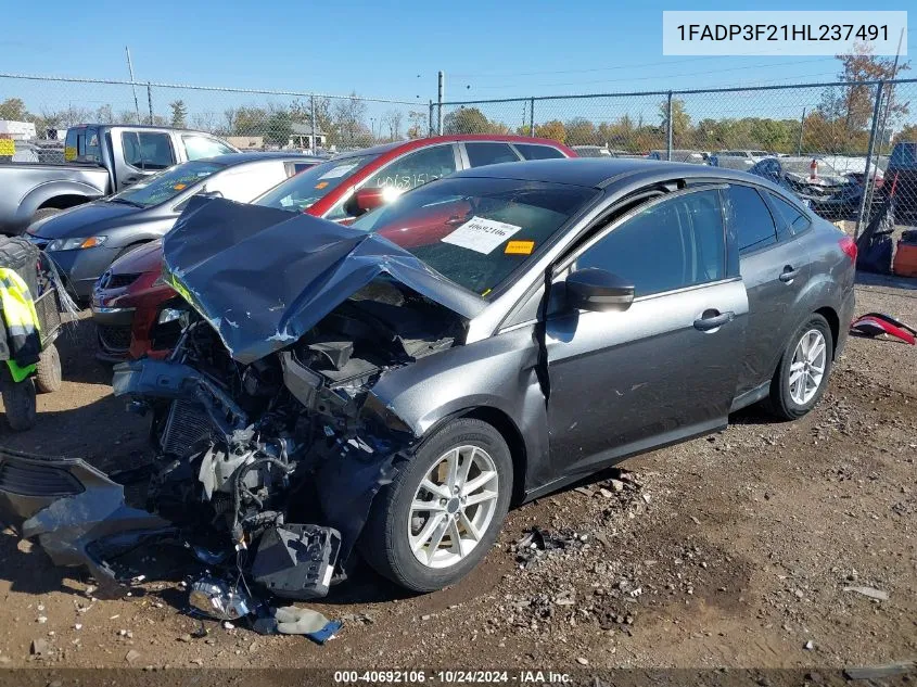 2017 Ford Focus Se VIN: 1FADP3F21HL237491 Lot: 40692106