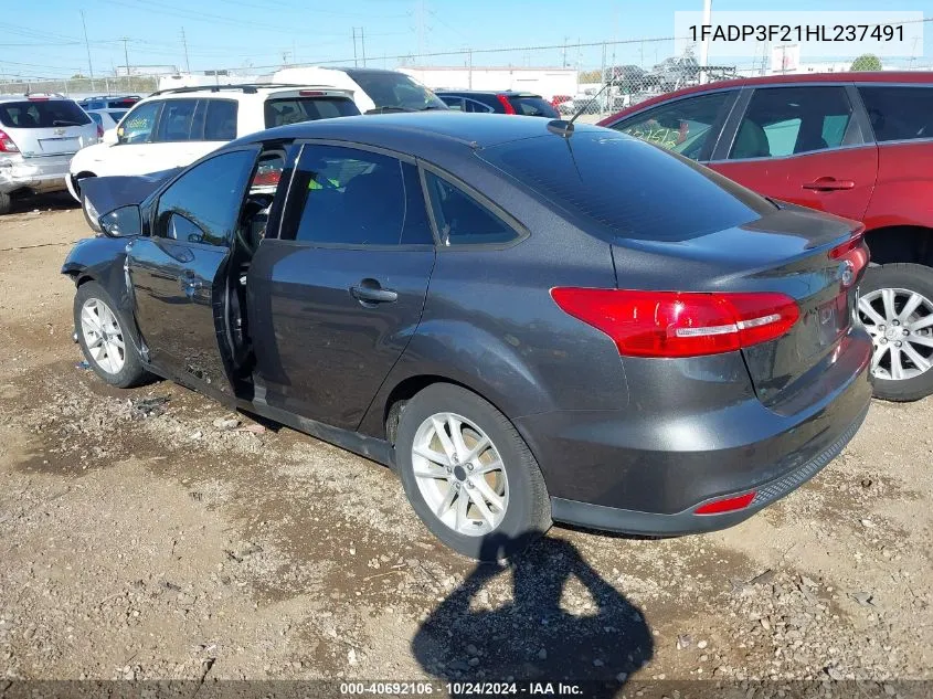 2017 Ford Focus Se VIN: 1FADP3F21HL237491 Lot: 40692106