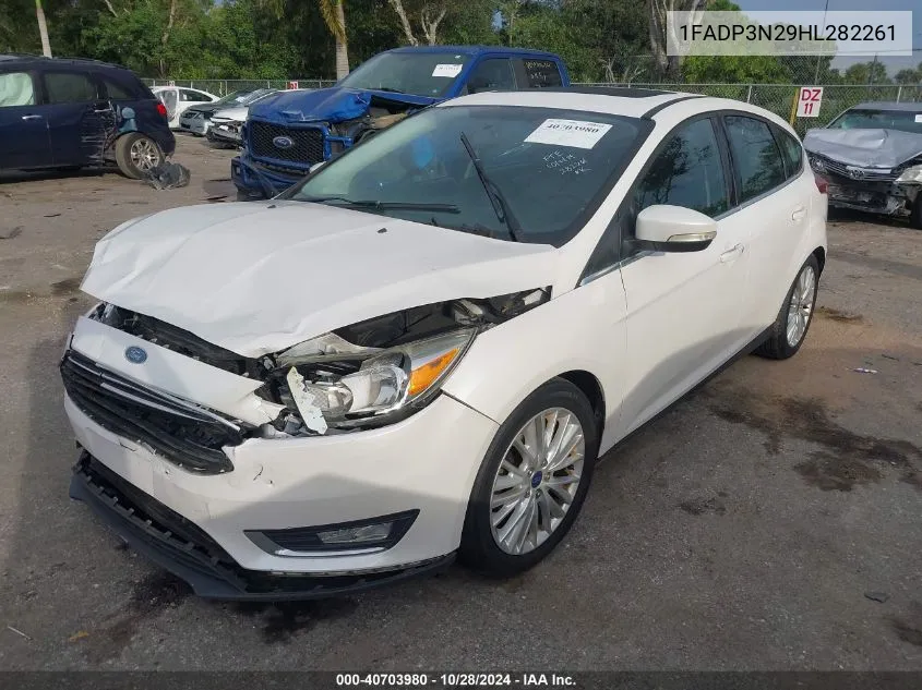 2017 Ford Focus Titanium VIN: 1FADP3N29HL282261 Lot: 40703980