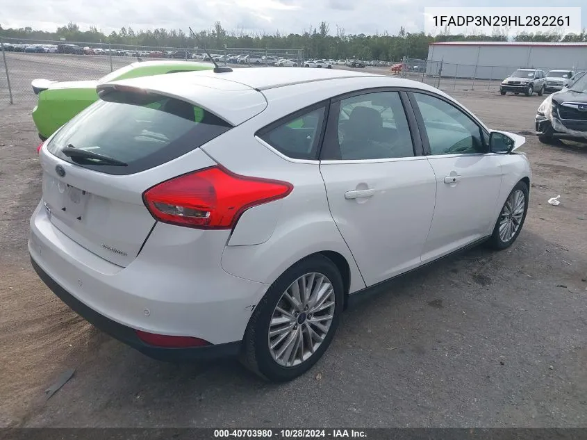 2017 Ford Focus Titanium VIN: 1FADP3N29HL282261 Lot: 40703980