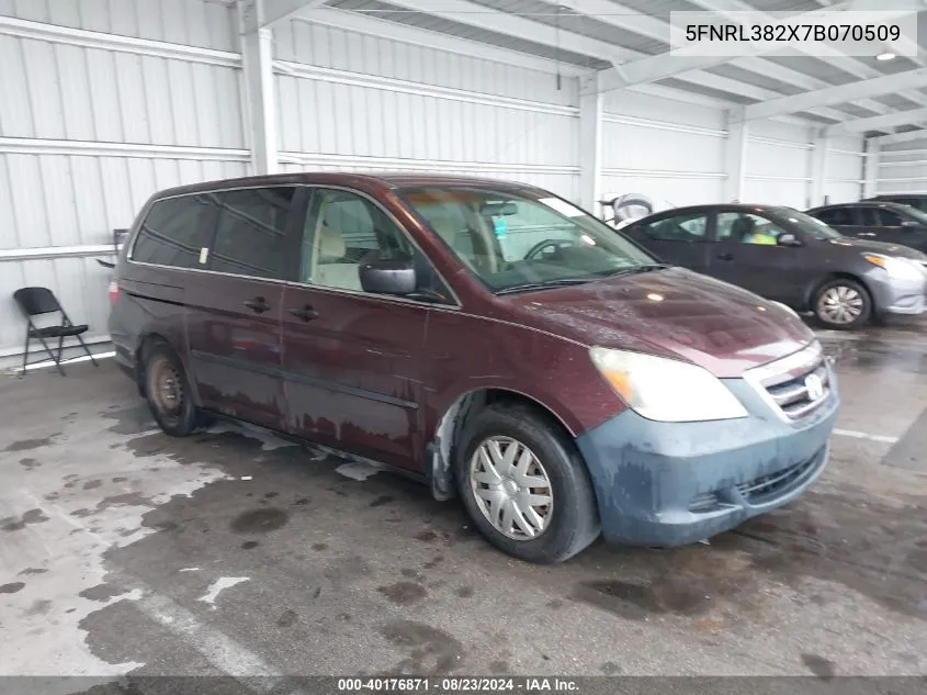 2007 Honda Odyssey Lx VIN: 5FNRL382X7B070509 Lot: 40176871