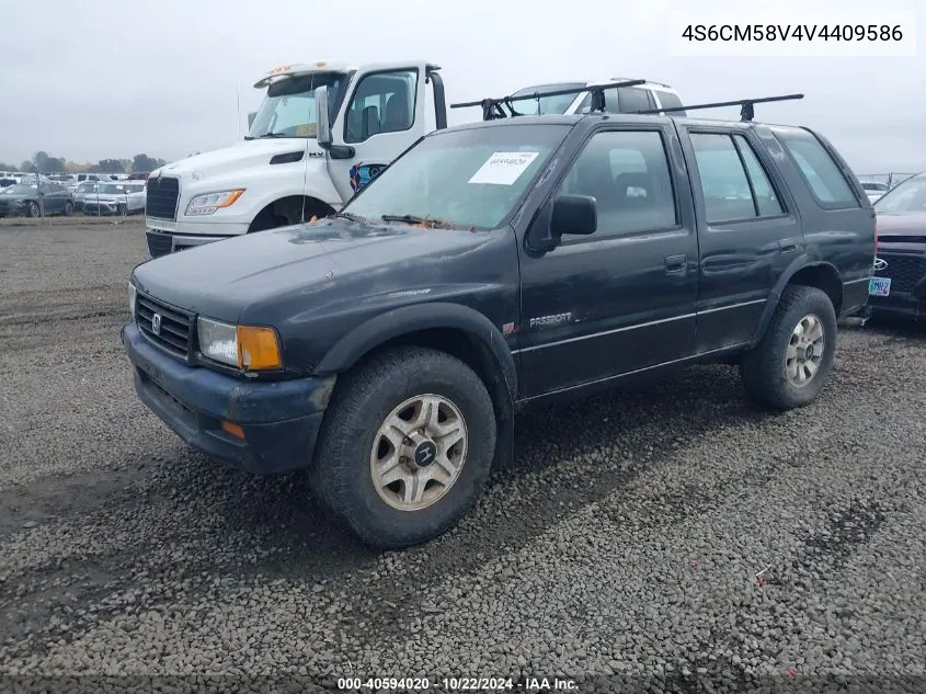 1997 Honda Passport Ex/Lx VIN: 4S6CM58V4V4409586 Lot: 40594020