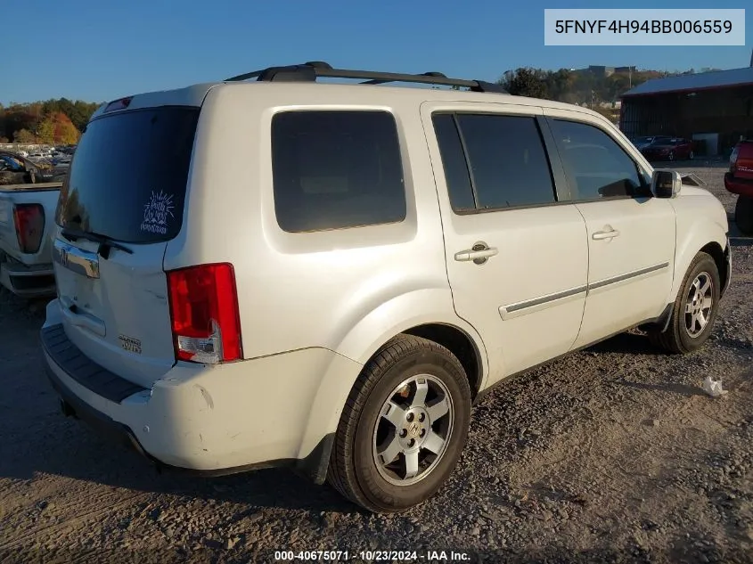 2011 Honda Pilot Touring VIN: 5FNYF4H94BB006559 Lot: 40675071