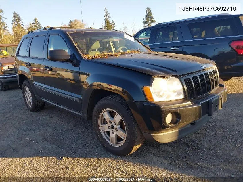 2007 Jeep Grand Cherokee Laredo VIN: 1J8HR48P37C592710 Lot: 40807621