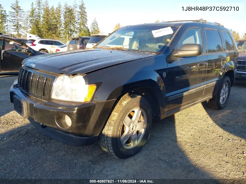 2007 Jeep Grand Cherokee Laredo VIN: 1J8HR48P37C592710 Lot: 40807621