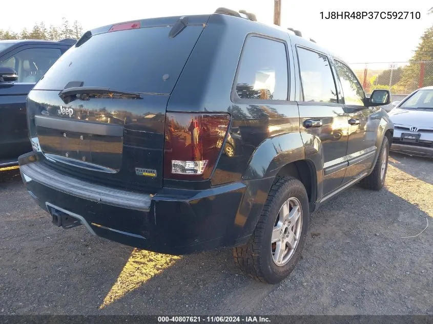 2007 Jeep Grand Cherokee Laredo VIN: 1J8HR48P37C592710 Lot: 40807621