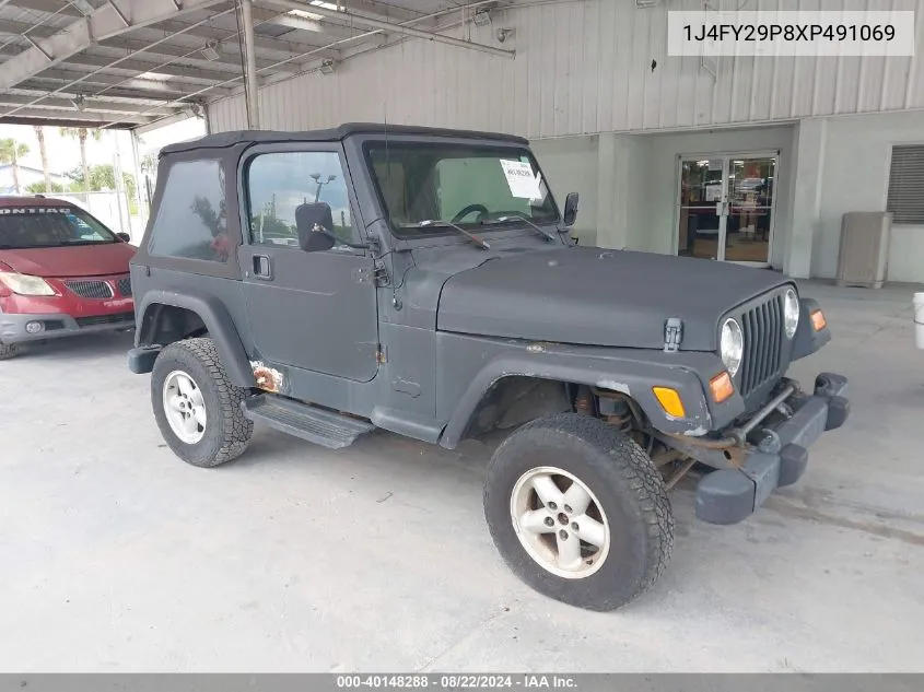 1999 Jeep Wrangler Se VIN: 1J4FY29P8XP491069 Lot: 40148288