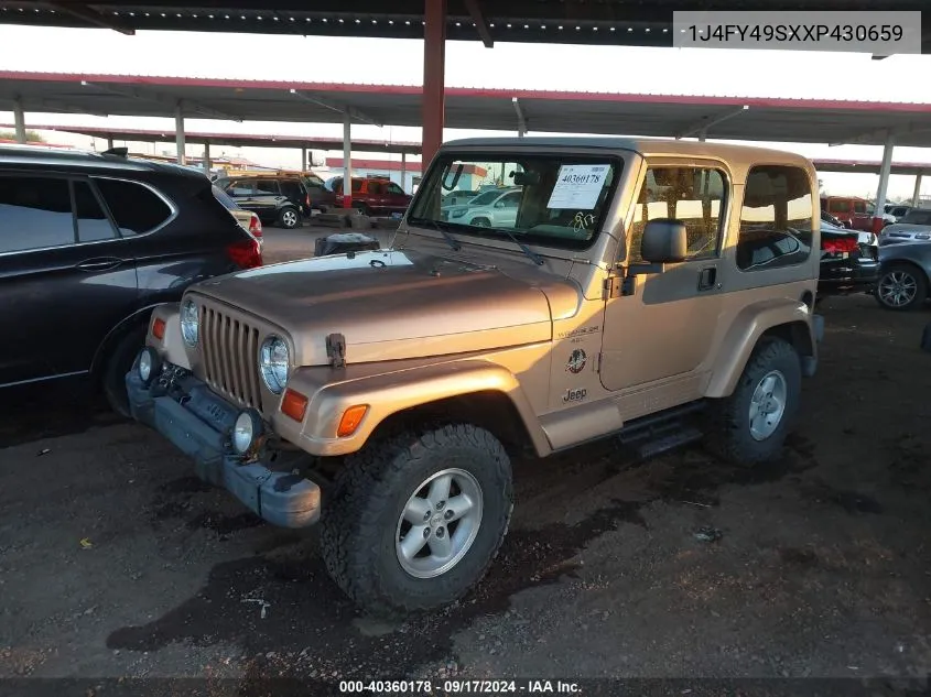 1999 Jeep Wrangler Sahara VIN: 1J4FY49SXXP430659 Lot: 40360178