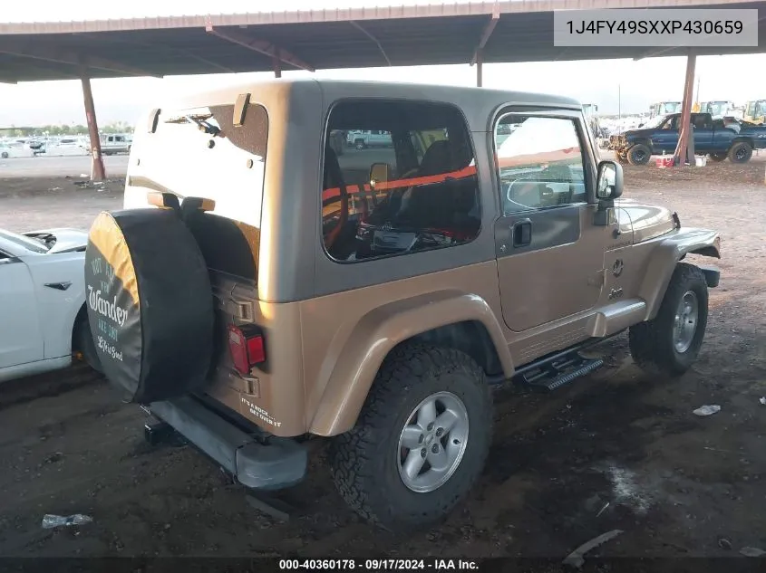 1999 Jeep Wrangler Sahara VIN: 1J4FY49SXXP430659 Lot: 40360178