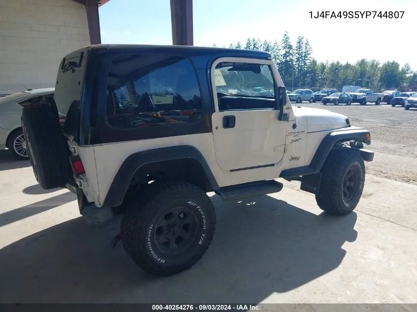 2000 Jeep Wrangler Sport VIN: 1J4FA49S5YP744807 Lot: 40254276