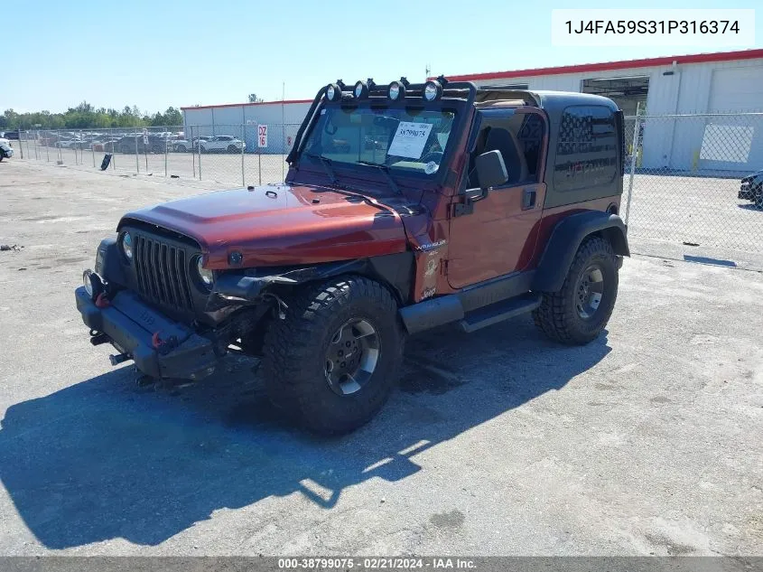 2001 Jeep Wrangler Sahara VIN: 1J4FA59S31P316374 Lot: 38799075