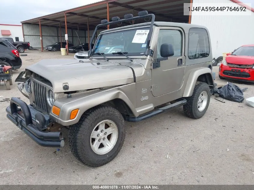 2004 Jeep Wrangler Sahara VIN: 1J4FA59S44P764692 Lot: 40801078