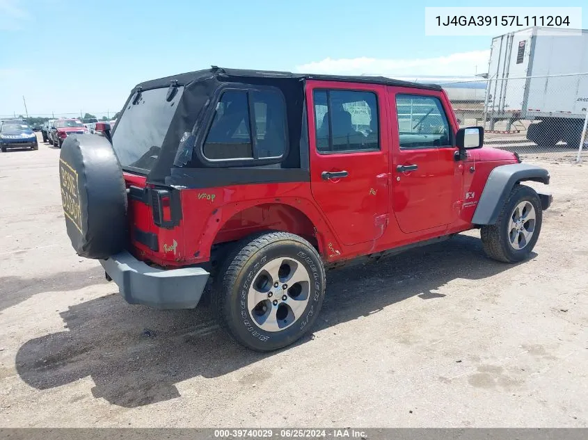 2007 Jeep Wrangler Unlimited X VIN: 1J4GA39157L111204 Lot: 39740029