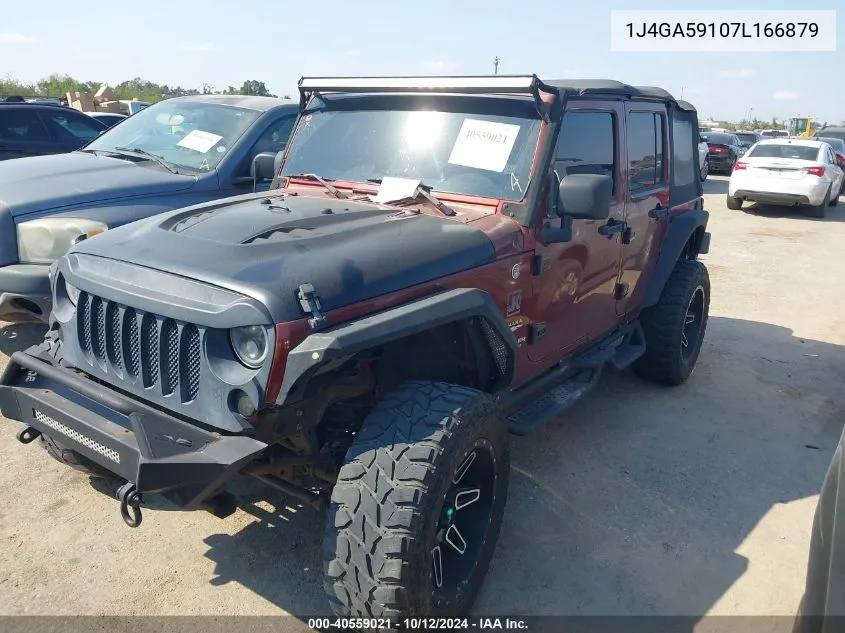 2007 Jeep Wrangler Unlimited Sahara VIN: 1J4GA59107L166879 Lot: 40559021