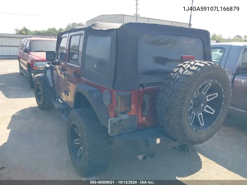 2007 Jeep Wrangler Unlimited Sahara VIN: 1J4GA59107L166879 Lot: 40559021