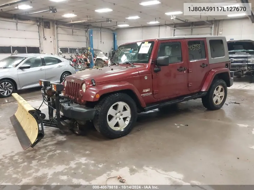 2007 Jeep Wrangler Unlimited Sahara VIN: 1J8GA59117L127670 Lot: 40579818