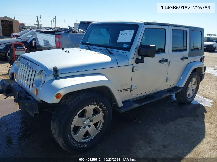 2007 Jeep Wrangler Unlimited Sahara VIN: 1J4GB59187L226789 Lot: 40629512