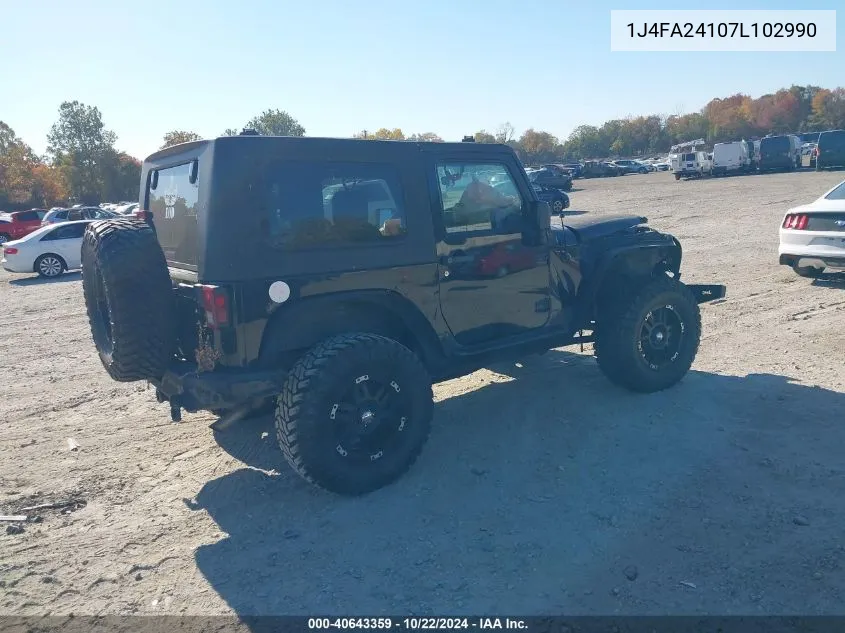 2007 Jeep Wrangler X VIN: 1J4FA24107L102990 Lot: 40643359