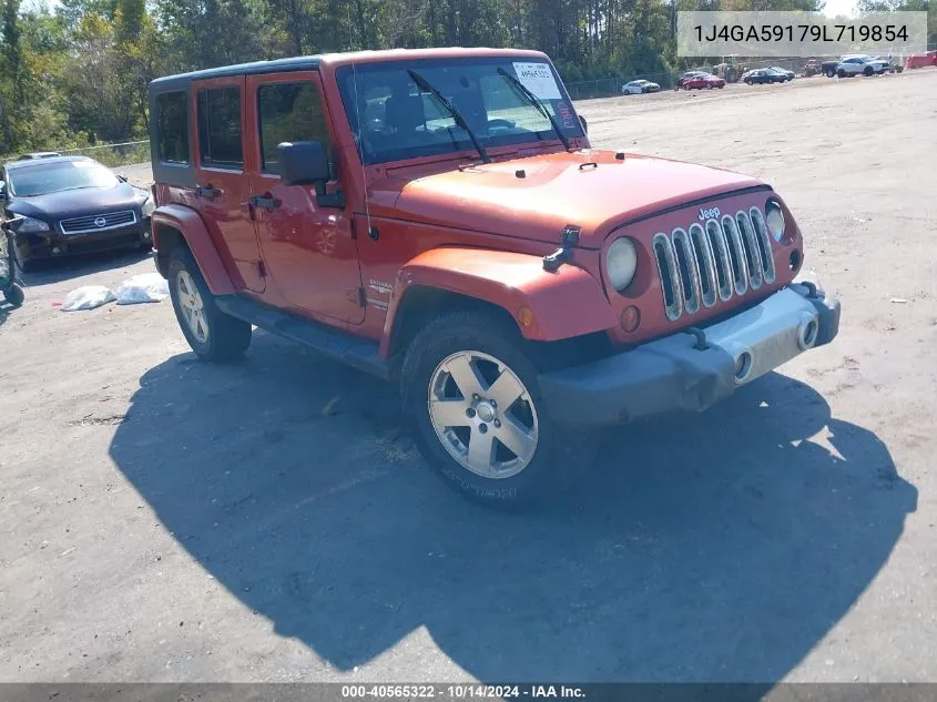 2009 Jeep Wrangler Unlimited Sahara VIN: 1J4GA59179L719854 Lot: 40565322