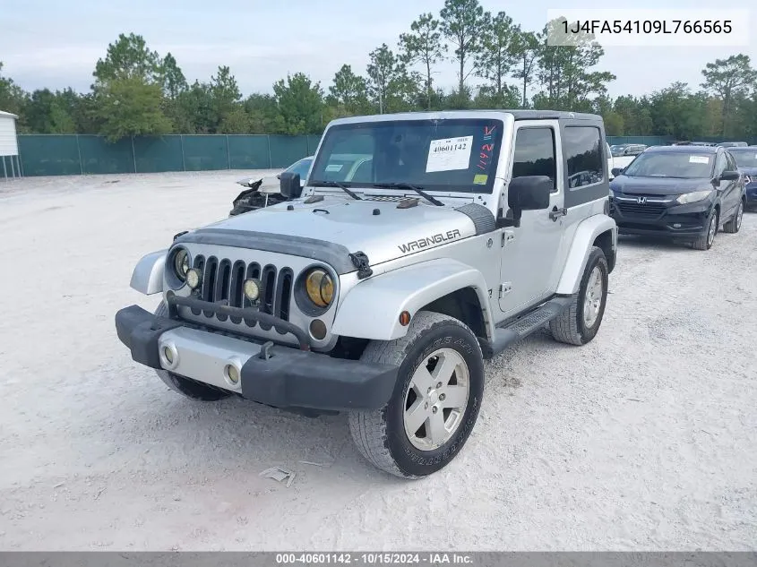 2009 Jeep Wrangler Sahara VIN: 1J4FA54109L766565 Lot: 40601142