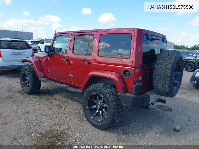 2011 Jeep Wrangler Unlimited Sahara VIN: 1J4HA5H15BL575586 Lot: 40388683