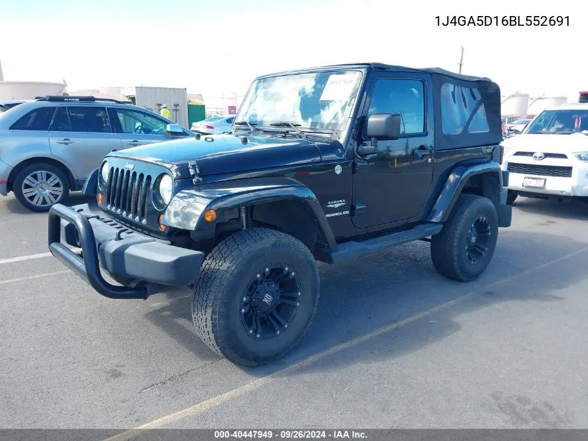 2011 Jeep Wrangler Sahara VIN: 1J4GA5D16BL552691 Lot: 40447949