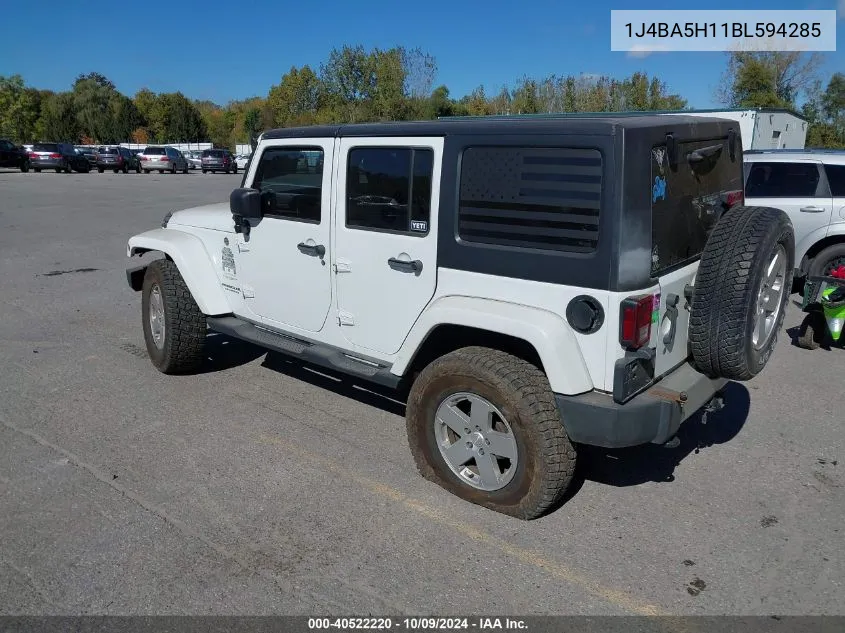 2011 Jeep Wrangler Unlimited Sahara VIN: 1J4BA5H11BL594285 Lot: 40522220