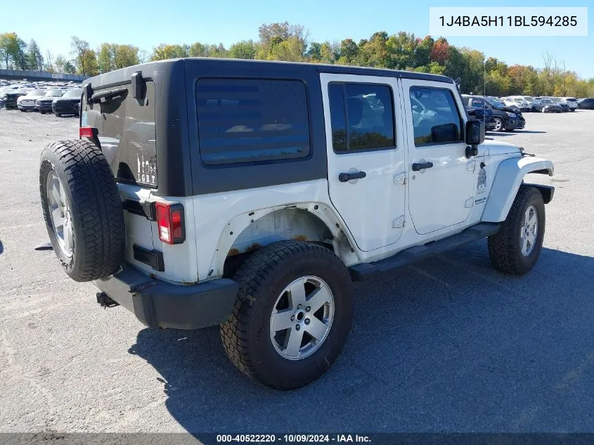 2011 Jeep Wrangler Unlimited Sahara VIN: 1J4BA5H11BL594285 Lot: 40522220