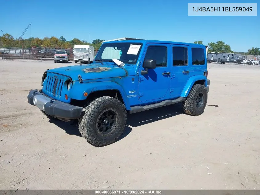 2011 Jeep Wrangler Unlimited Sahara VIN: 1J4BA5H11BL559049 Lot: 40556971