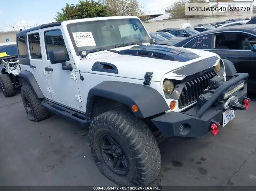 1C4BJWDG4DL523770 2013 Jeep Wrangler Unlimited Sport