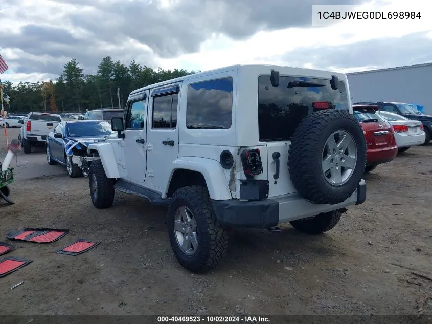 2013 Jeep Wrangler Unlimited Sahara VIN: 1C4BJWEG0DL698984 Lot: 40469523