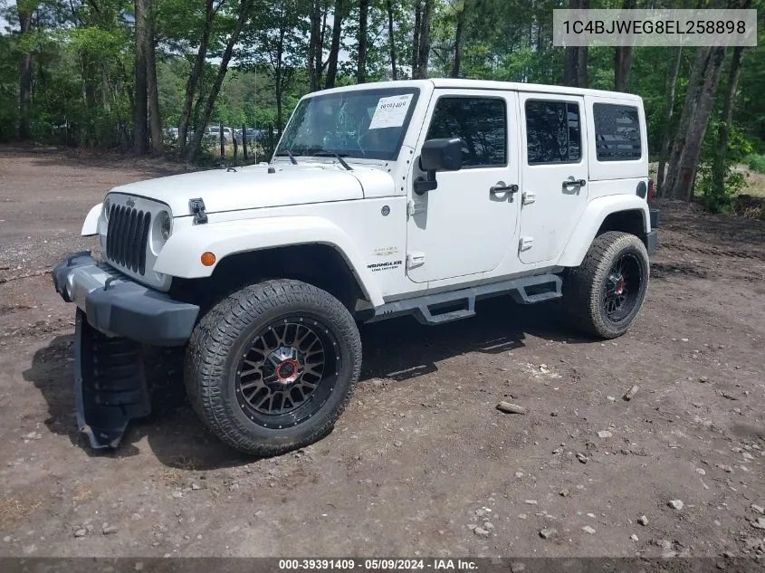 2014 Jeep Wrangler Unlimited Sahara VIN: 1C4BJWEG8EL258898 Lot: 39391409